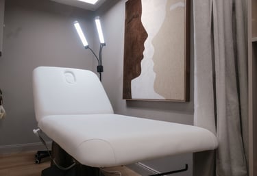 a white chair with a light on it