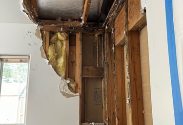 hot water pipe leaked in to bathroom ceiling down the wall
