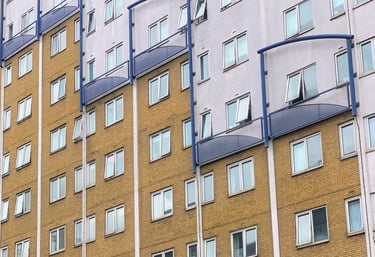 Block of flats with white and gold painting