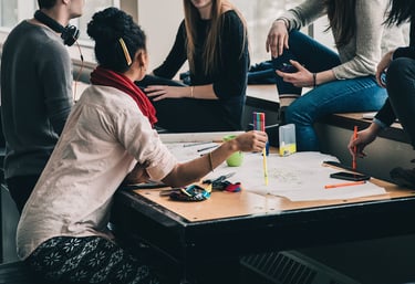 Image by StockSnap from Pixabay.  People coming together for a discussion of information