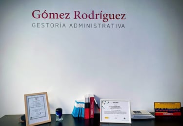 a desk with a laptop and a laptop on it