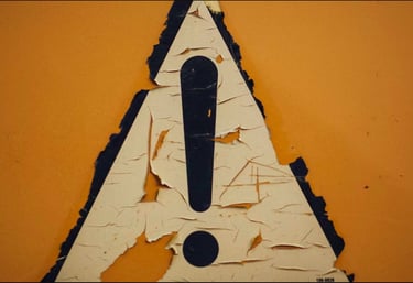 caution sign for gold IRA risks and considerations