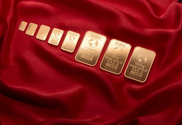 gold bars layed out in a row symbolizing blog post augusta precious metals, a gold ira company and why you should choose them