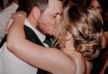 Couple having a first dance and kissing
