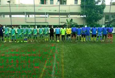 Football players enjoying a match on artificial turf