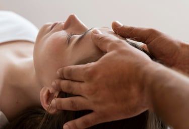 a woman is getting her eyes closed while she is getting her eyes closed