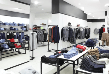 a clothing store with a variety of clothes and clothes