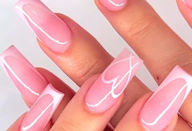 a woman's hand painted nails and nails on her nails
