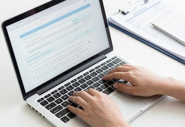 Smiling client shaking hands with a consultant after a successful visa appeal.