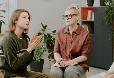 a group of people having a mindful session
