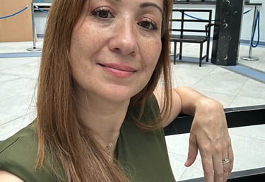 a woman in a green shirt and a black and white shirt