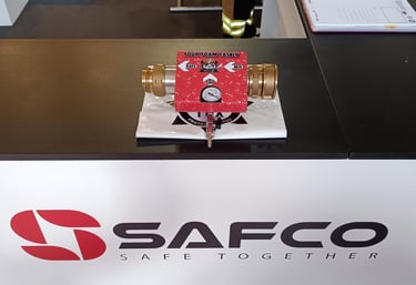 a table with a RAFS and a white sign that says safc