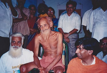 three tantric gurus sitting together