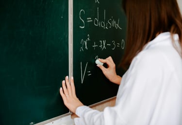A Level Mathematics online tutoring shown by A level Maths written on a board
