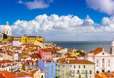 a view of a city with a view of the ocean