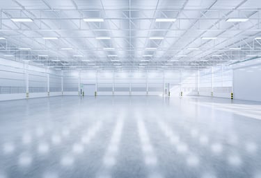 An empty warehouse with LED lighting