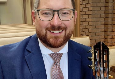 Dan Kyzer plays guitar at a wedding in Fort Worth, Texas