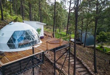 a dome shaped glass dome with a deck and a deck