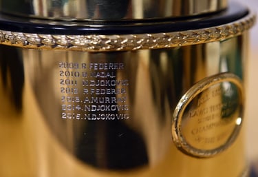 a gold trophy engraved