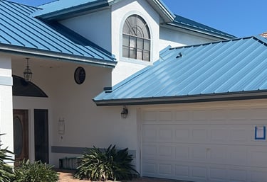 a house with a blue roof and a blue roof