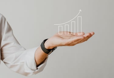 a man holding a hand with a diagram of a bar graphing chart