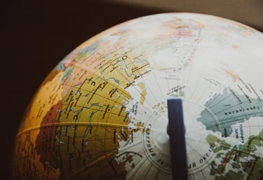 globe showing different countries and nations representing Gold IRA and geopolitical risk
