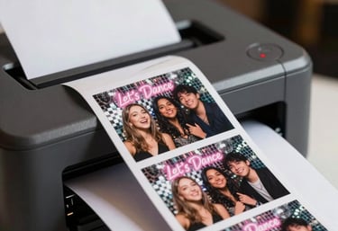 Close-up of instant photo prints emerging from a stylish photobooth machine.