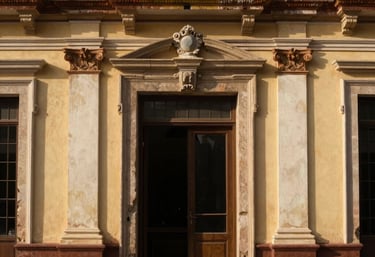 A beautifully restored historical facade of a South American building, elegant warm lighting, perfect paint finish, conveying craftsmanship.