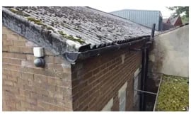 asbestos-corrugated-roof on-building-scotland-uk-needs-removed-carefully-protecting-public-2026-webp