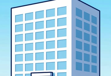 A sleek, industrial building facade with minimalistic design under a clear blue sky.