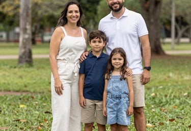 Close-up of legal scales and a gavel on a wooden desk.
