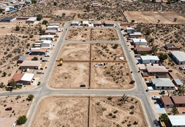 Minimalist black and white luxury real estate interior with red accent lighting highlighting architectural details.