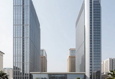 Modern architectural blueprint spread over a wooden desk with a green plant nearby.