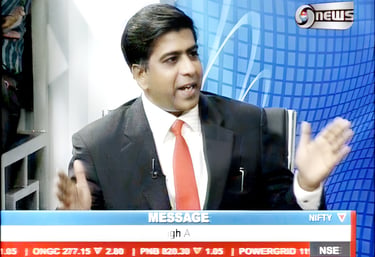 a man in a suit and tie is holding a microphone