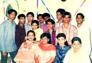 a group of people standing around a table