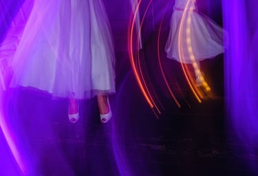 Blurry photo of dancing with purple lighting
