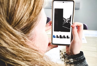 Girl making picture with cameraphone