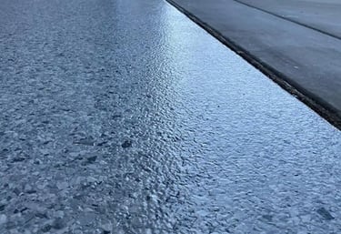 Flake system resin floor with top coat in Garage