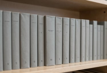 A minimalist library or study area with sage grey books and soft lighting, symbolizing education and focus.