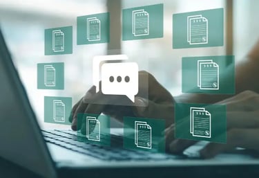 2 hands are working a laptop keyboard with various green documents.