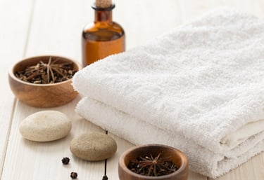 Portrait of a thoughtful person looking peacefully towards the horizon during sunset.