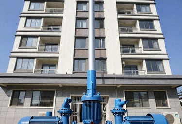 Technician installing an industrial hydraulic component in a modern commercial building.