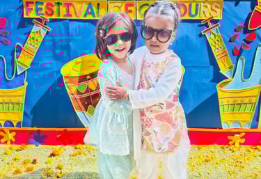 child playing and huging each other at an event at Enfant pre school Ghaziabad
