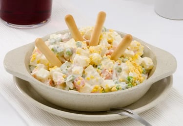 a bowl of food with a fork and spoon