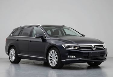 A professional automotive photo of a black VW Passat B6 Variant. The setting is modern and minimalist, highlighting the car's utility and value. Brand colors #0A1128 and #F8F9FA are reflected in the clean environment.