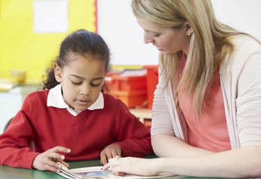 Specialist supporting child during educational assessment in Cheshire