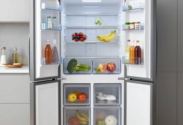 Close-up of a refrigerator being repaired with tools on a kitchen counter.