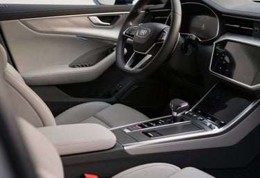 Clean and modern car interior with leather seating and high-tech dashboard, luxury feel, Central European car design, soft natural lighting.