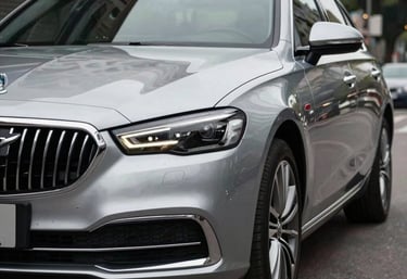 Detail of a professional luxury sedan in a clean Mexican urban setting, emphasizing safety and sophisticated design.