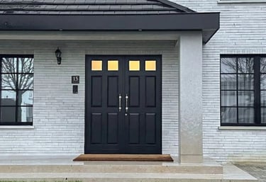 wood door and black wood window frames